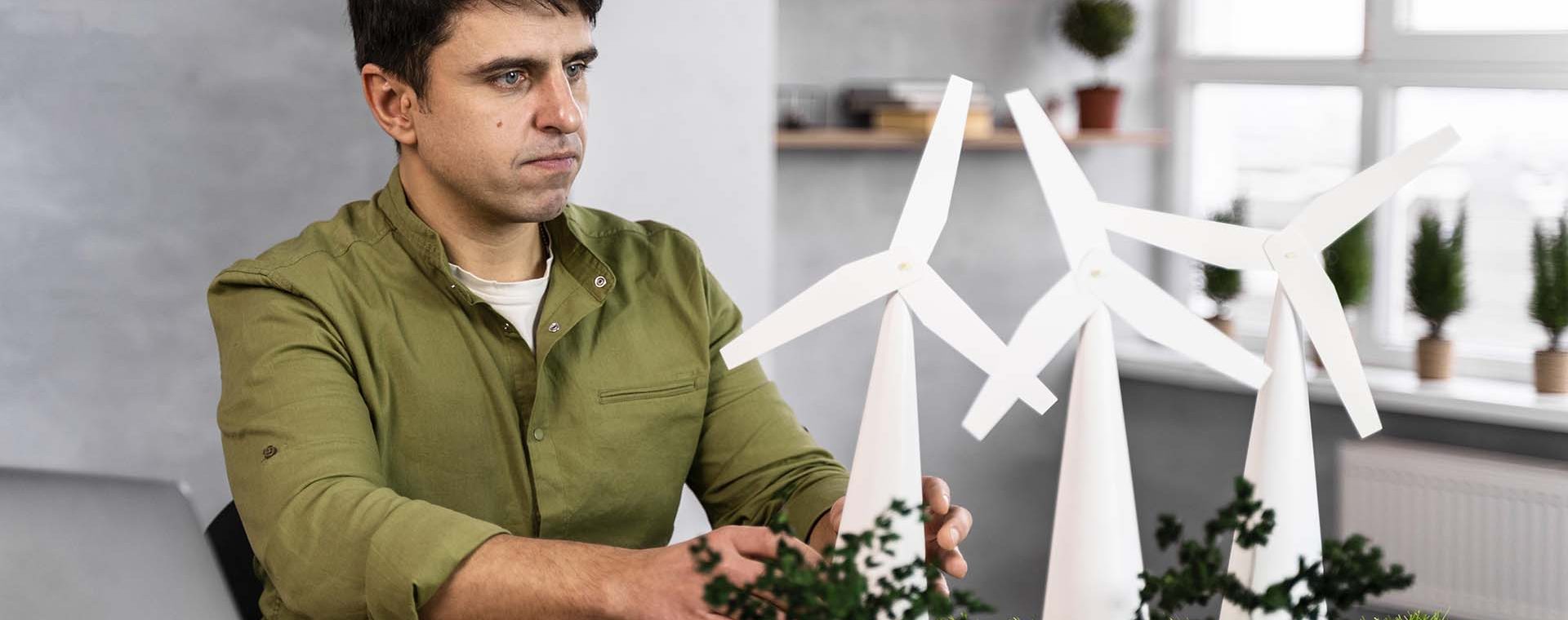 man-working-eco-friendly-wind-power-project-min